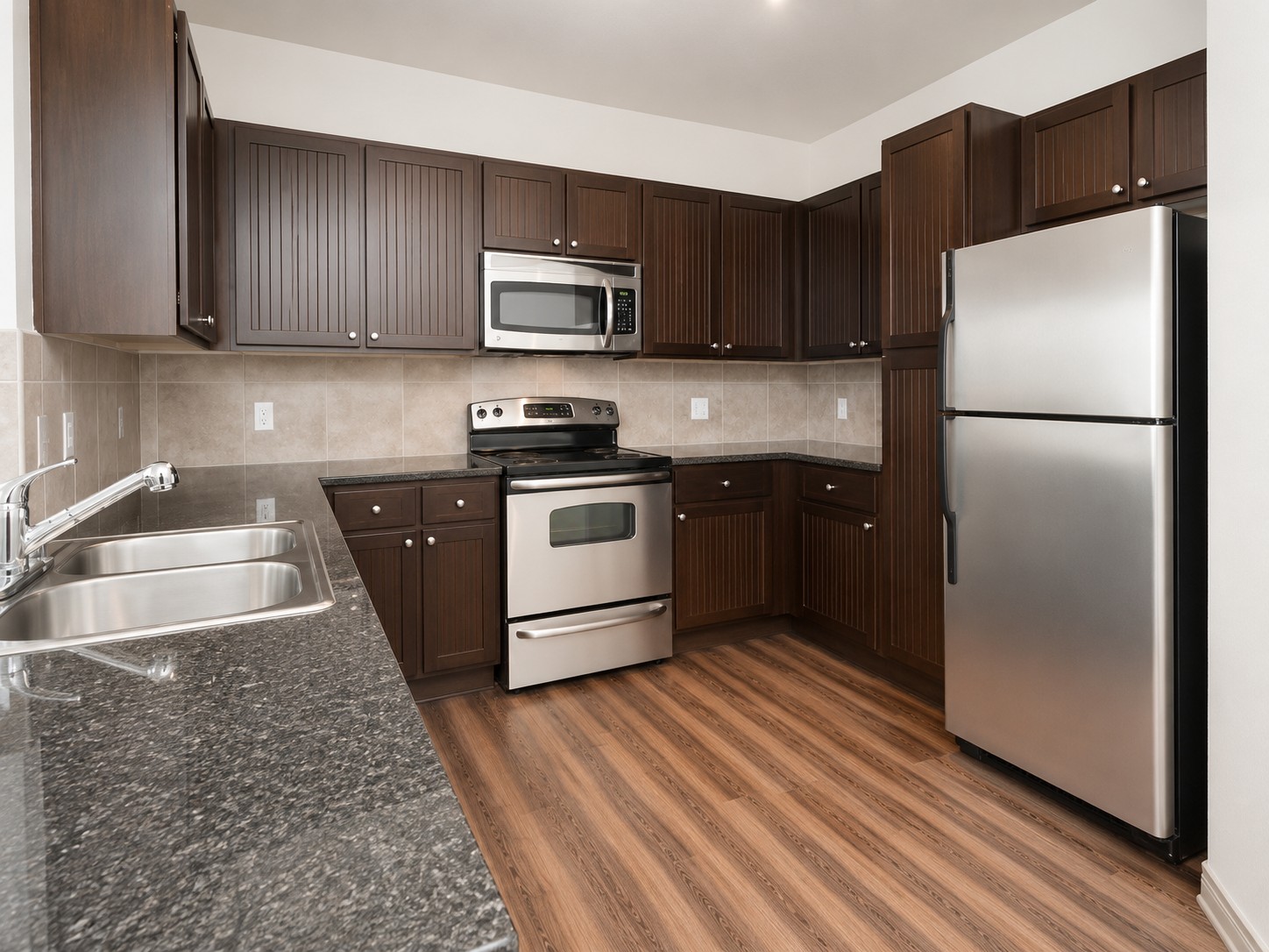 Furnished Kitchen with Faux Marble Countertop