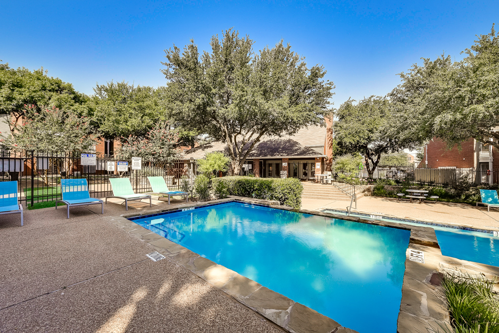 Outdoor Community Pool With Sundecks at Pacifica Apartments in Dallas,TX