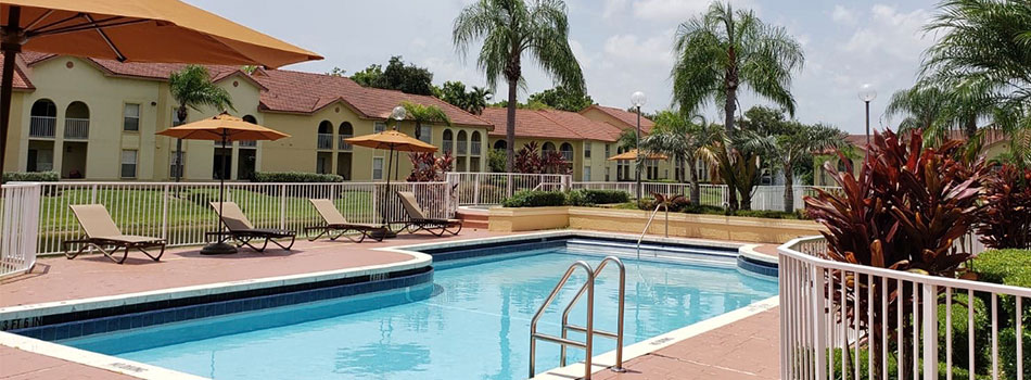 Gated pool with cabana at Pepper Cove Apartments