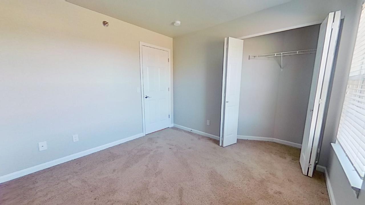 Bedrooms With Built-in Closets at Polo Downs Apartments in Fenton, MO