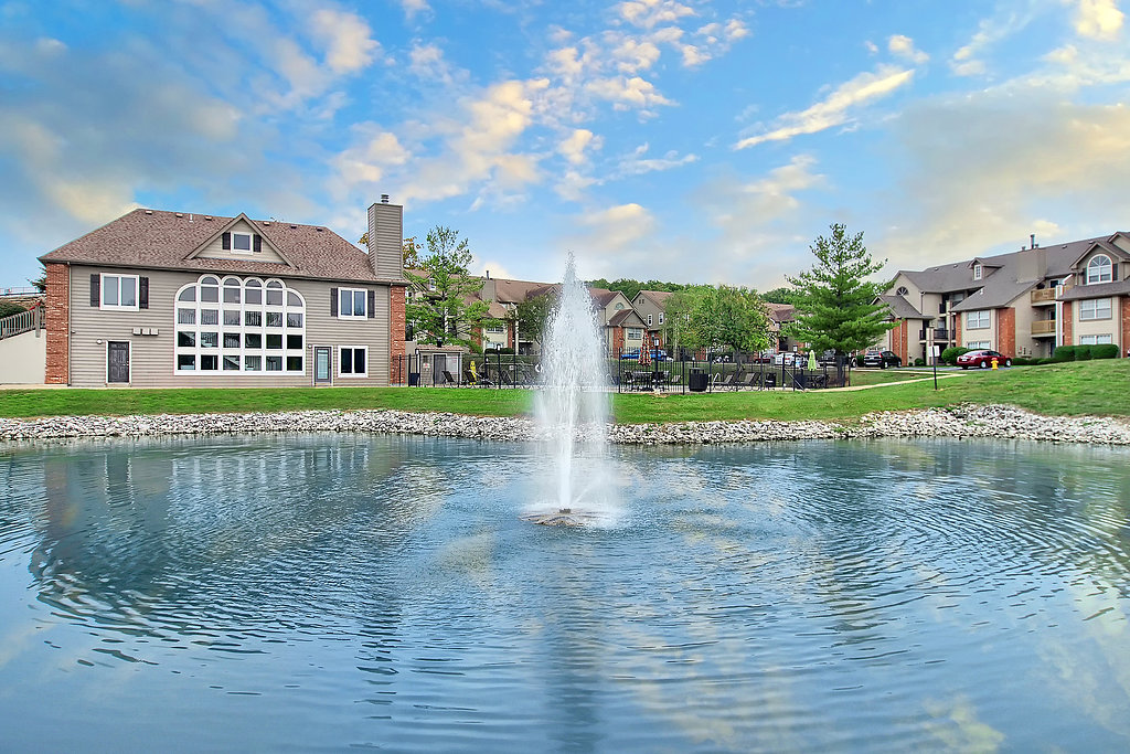 Lake with Fountain View at Polo Downs Apartments in Fenton, MO