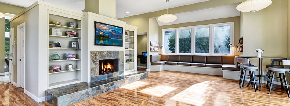 Well-lit Living Room with marbled fireplace