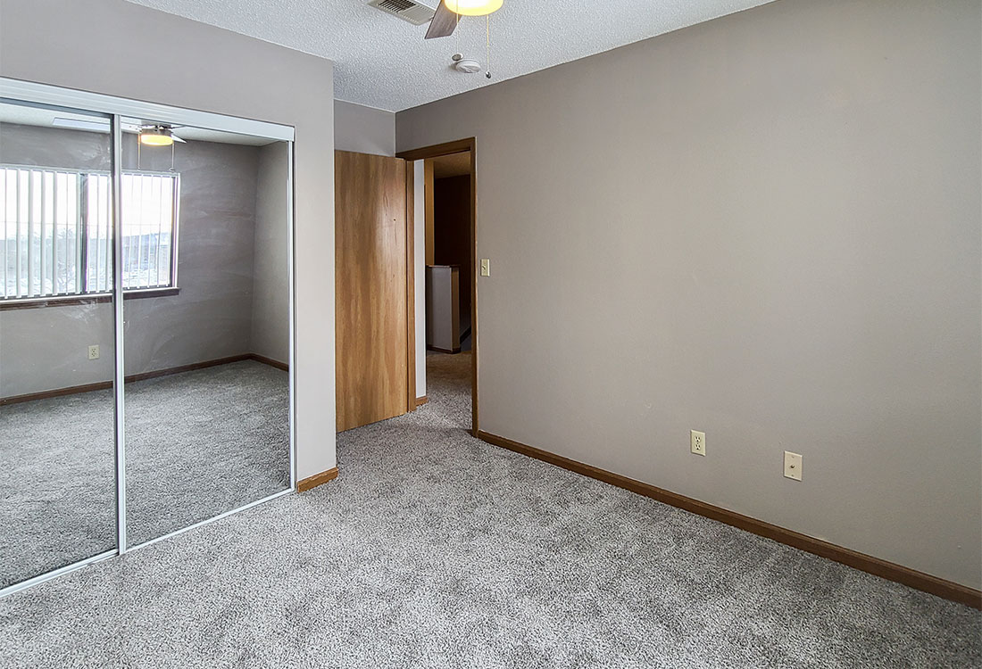 Upgraded Bedroom with Ample Closet Space at Prairie West in North Ames, IA