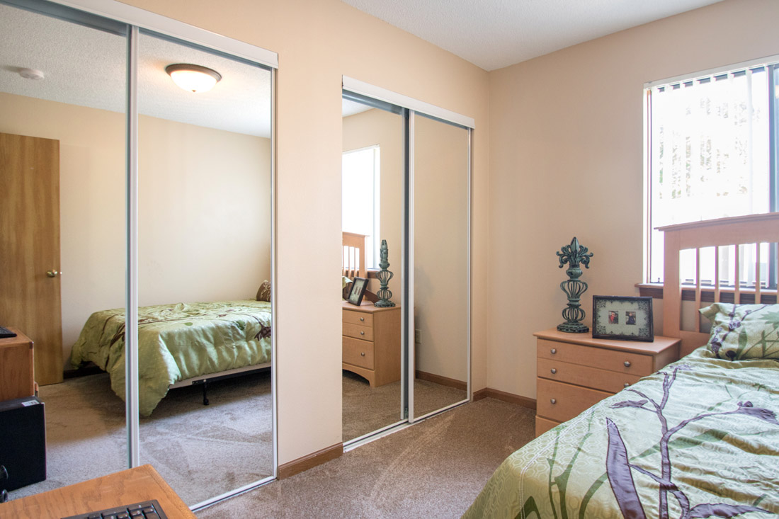 Bedroom with Ample Closet Space at Prairie West in North Ames, Iowa