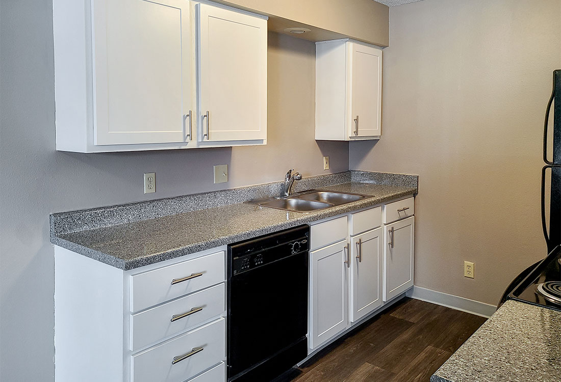 Upgraded Kitchen with Black Appliances at Prairie West in North Ames, Iowa