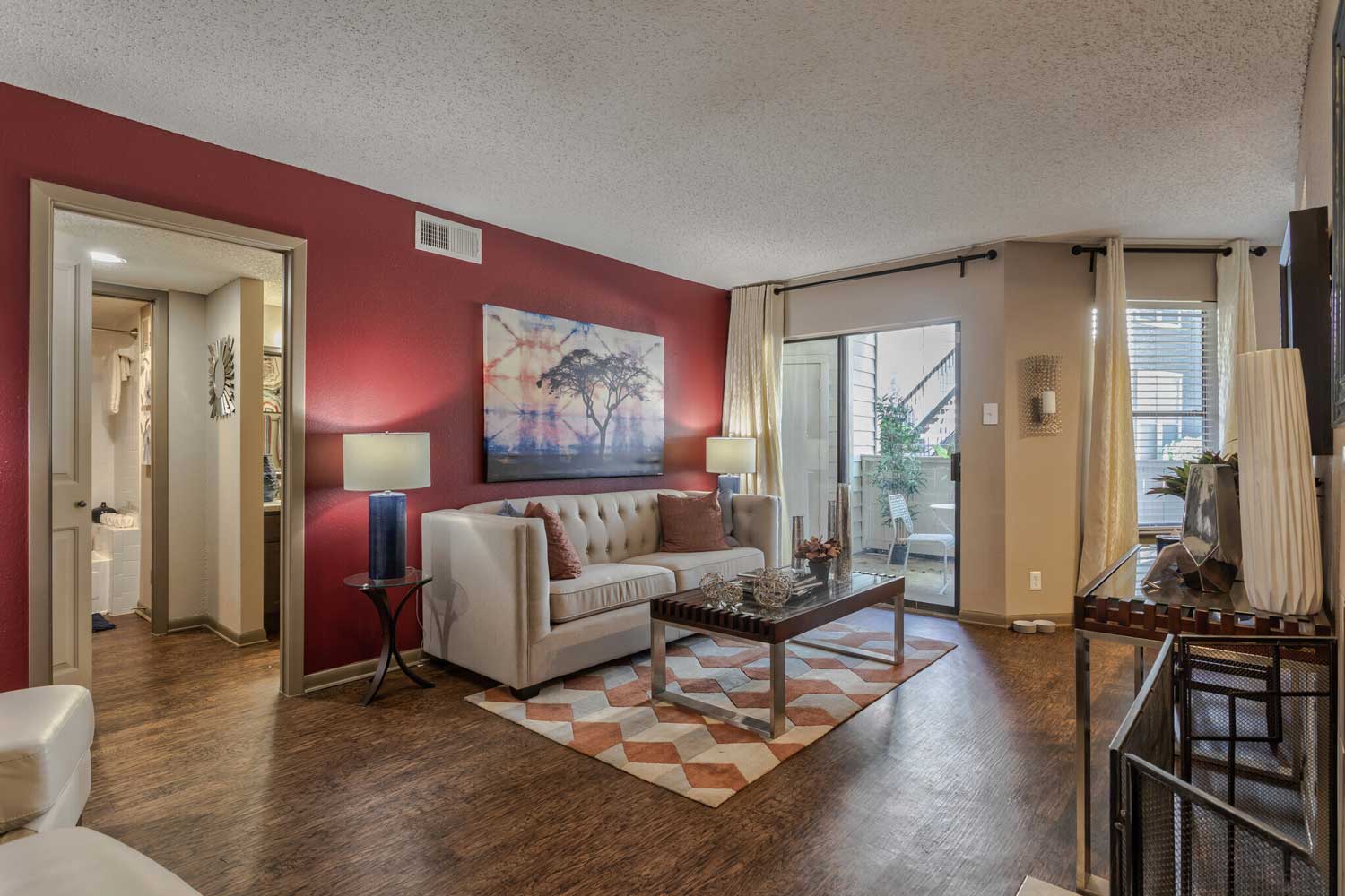 Living Room with Natural Light at Ridgeview Place Apartments in Irving, TX
