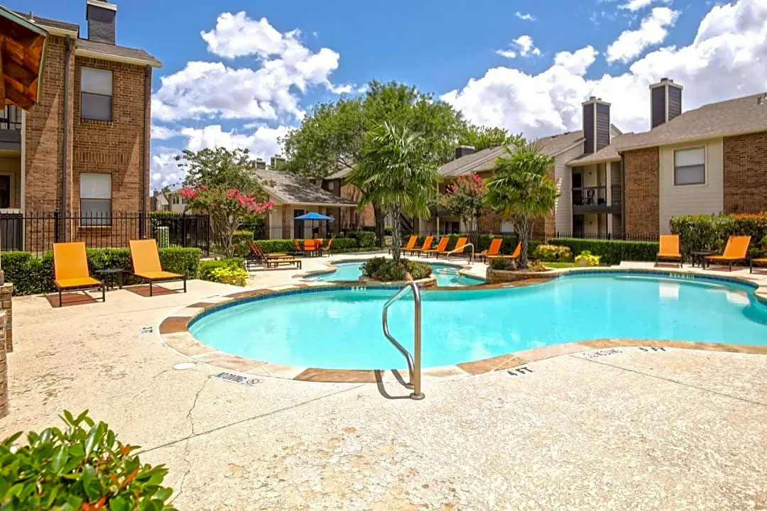 Outdoor Swimming Pool at Ridgeview Place Apartments in Irving, TX