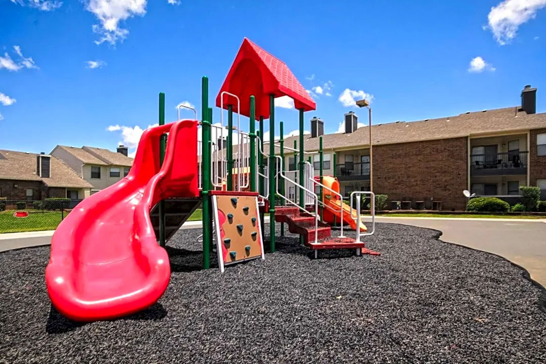 Children's Playground at Ridgeview Place Apartments in Irving, TX