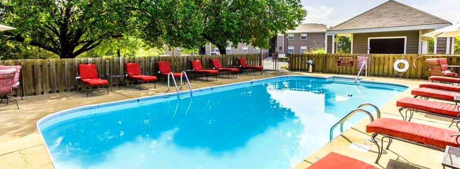 Swimming pool with sundeck at Ridgewood Apartments
