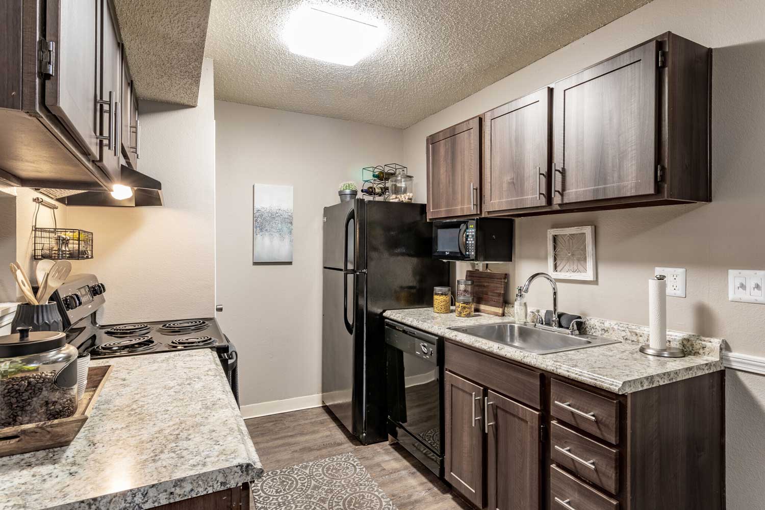 Well-Equipped Kitchen at Rustic Woods Apartments in Tulsa, Oklahoma
