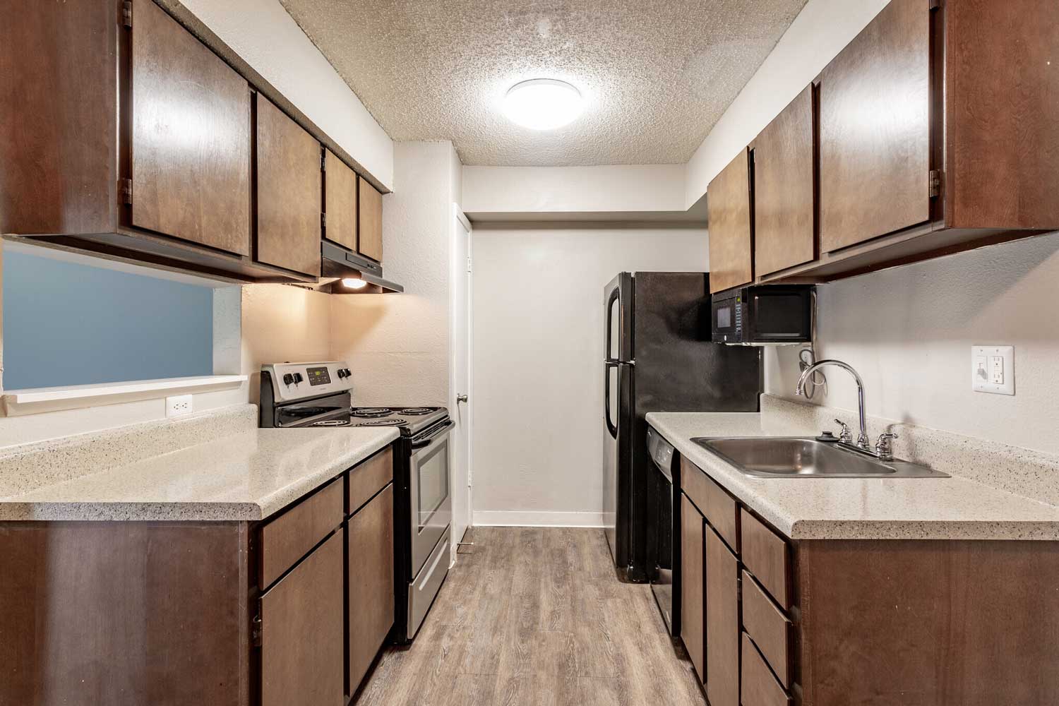 Updated Kitchen Designs at Rustic Woods Apartments in Tulsa, Oklahoma