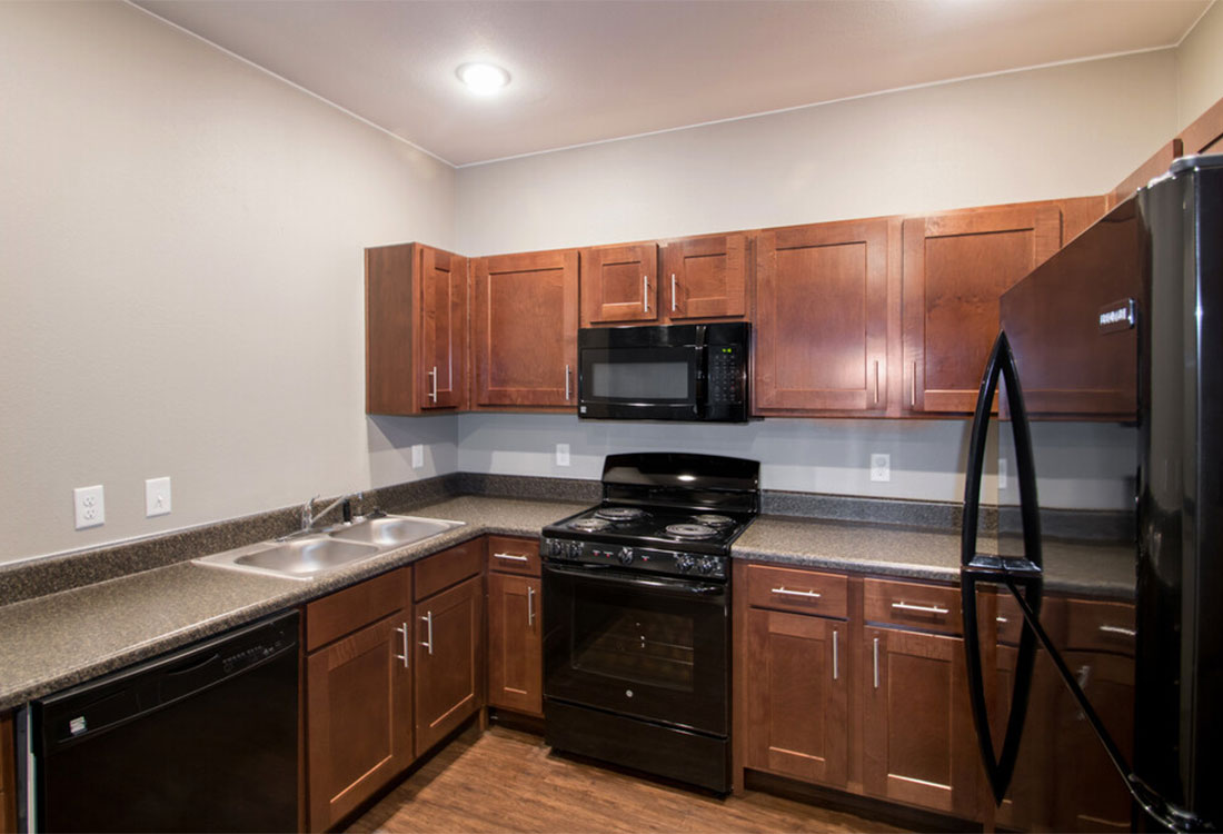 Fully Equipped Kitchens at Reserves at Saddleback Ranch Apartments in Wolfforth, Texas 	