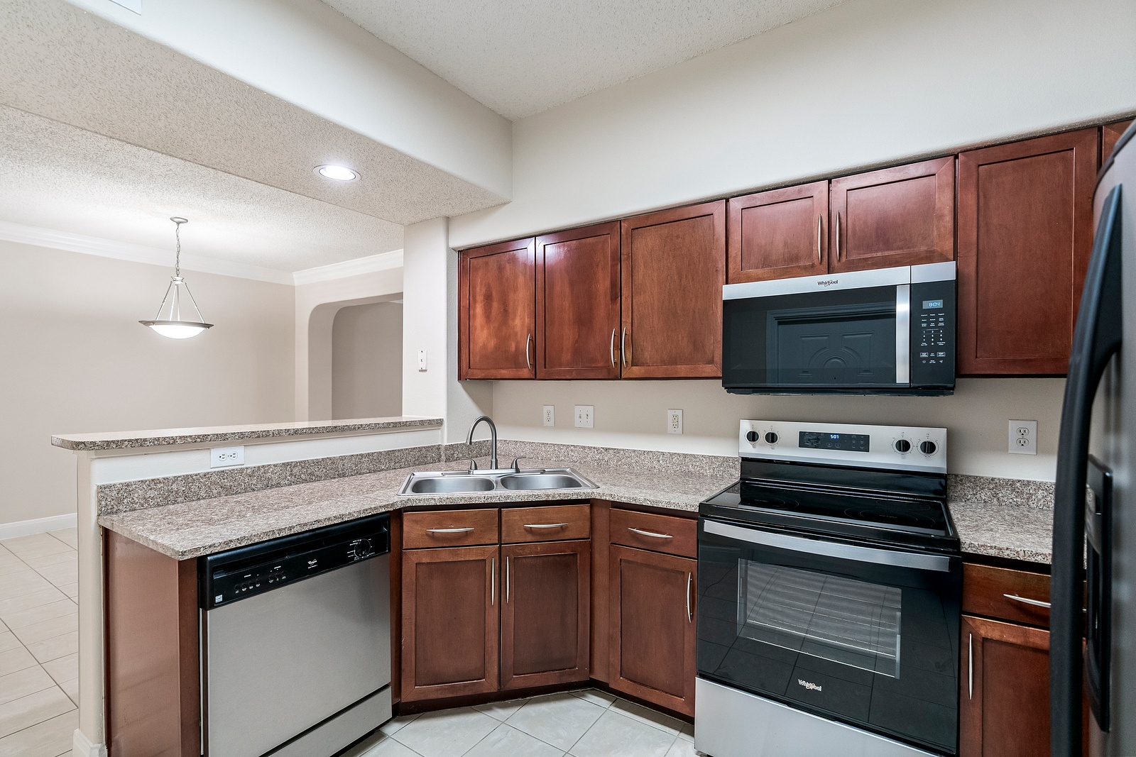 Open Concept Kitchen with Granite Countertops