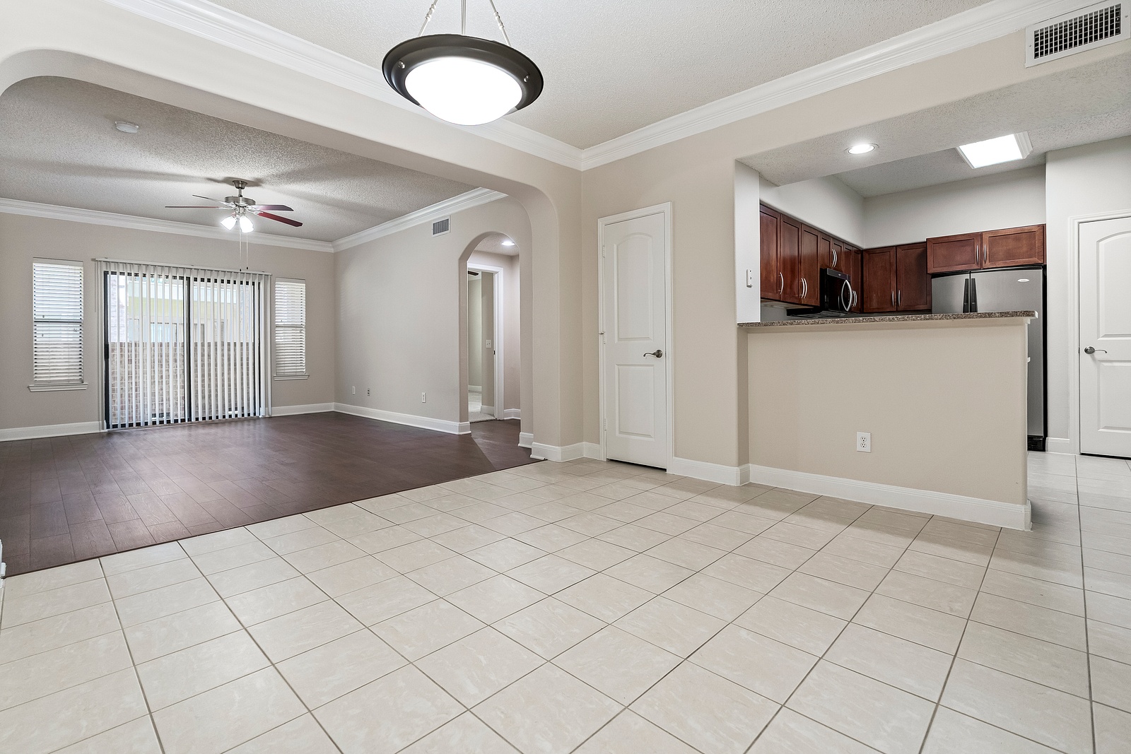 Open Concept Living Space with Tile Flooring