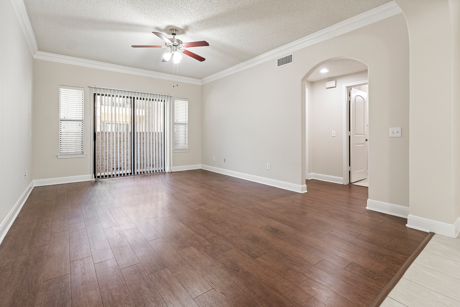Spacious Living Room with Wood-Style Flooring
