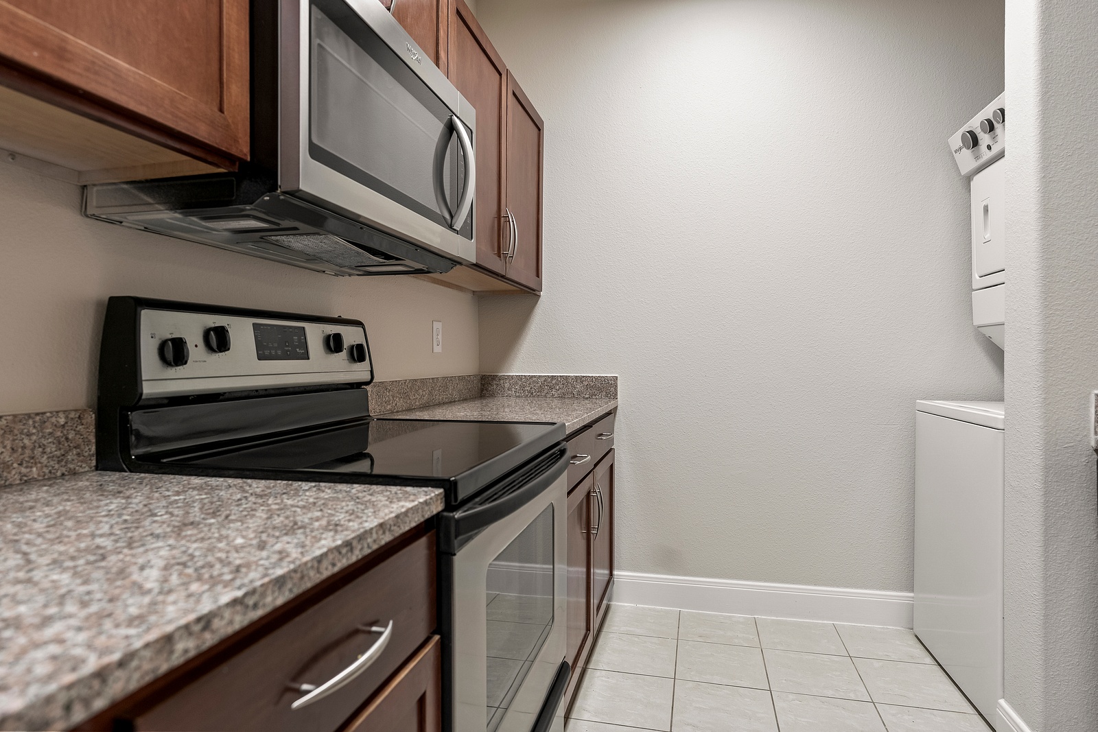 Fully Equipped Kitchen with In-Unit Laundry