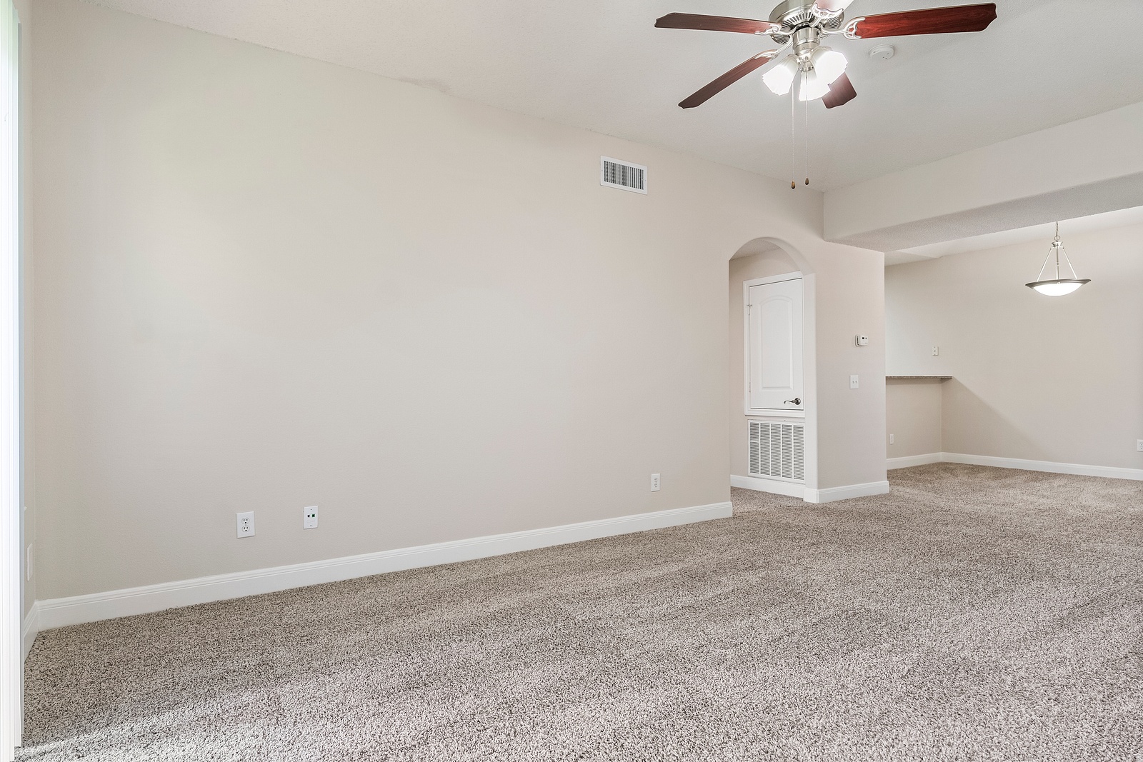 Spacious Living Room with Ceiling Fan