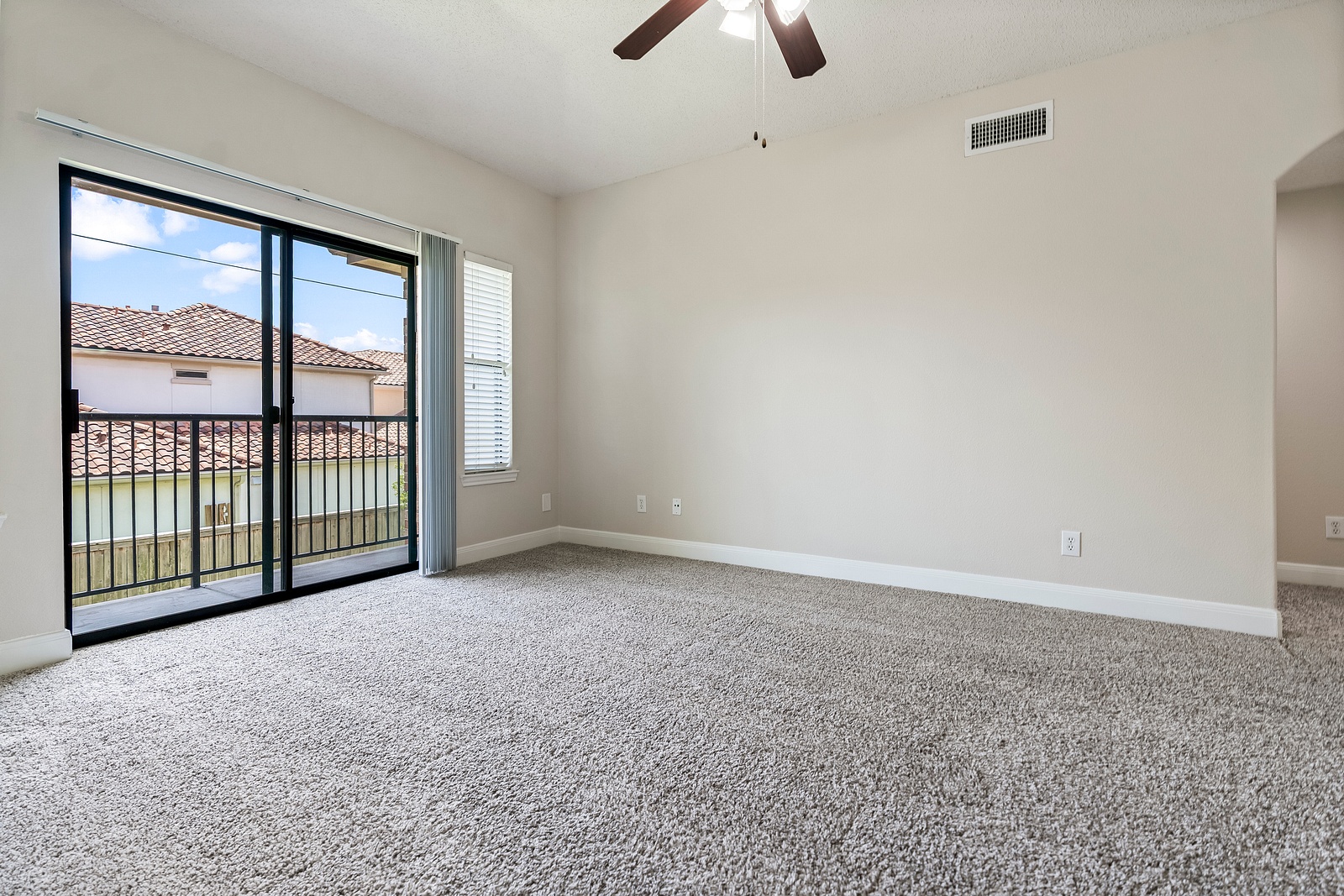 Spacious Bedroom with Balcony Access
