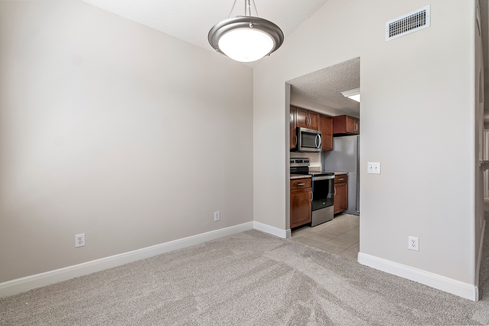 Dining Area with Pendant Lighting