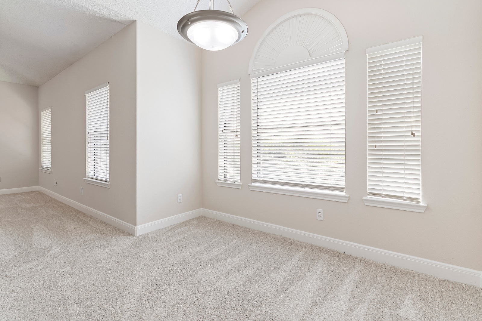 Spacious Room with Arched Picture Window