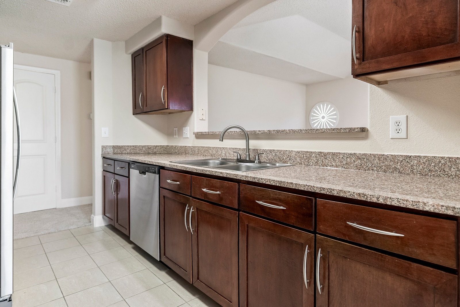 Fully Equipped Kitchen with Wood Cabinetry