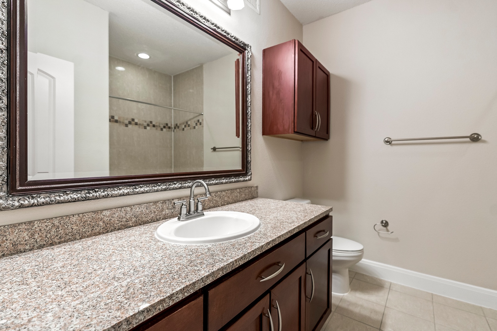 Elegant Bathroom with Granite Countertops