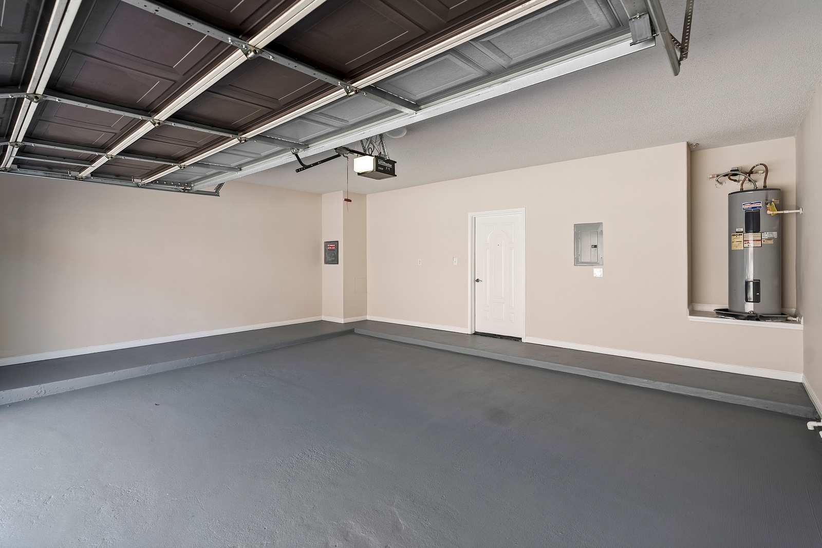 Attached Garage with Water Heater Storage