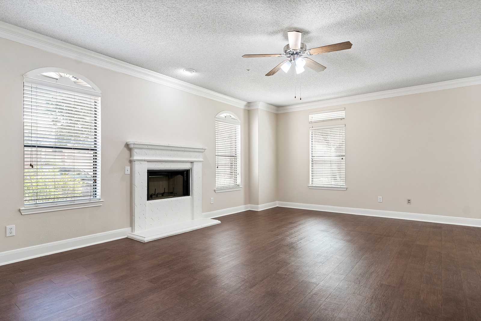 Living Room with Decorative Fireplace