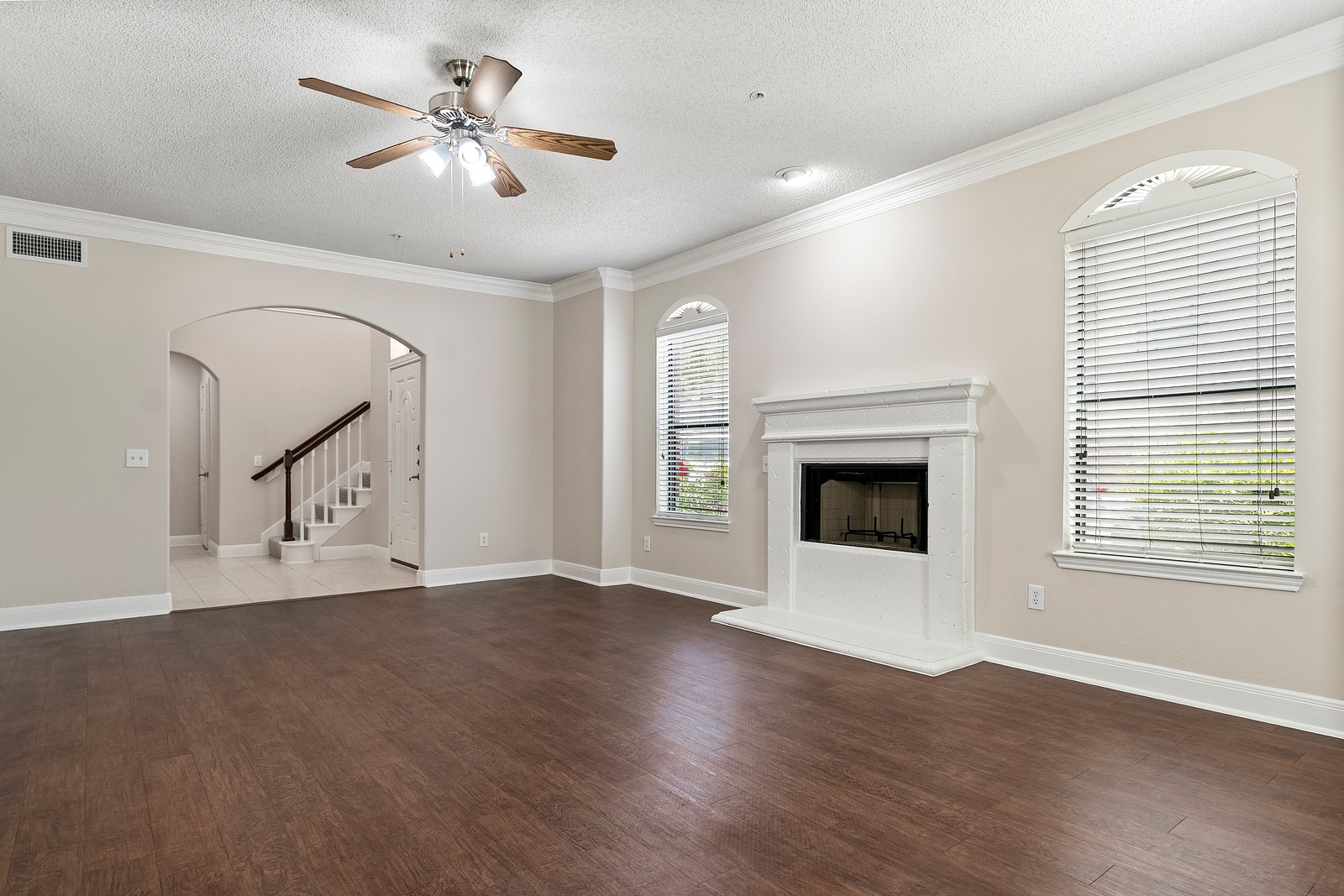 Living Room with Decorative Fireplace