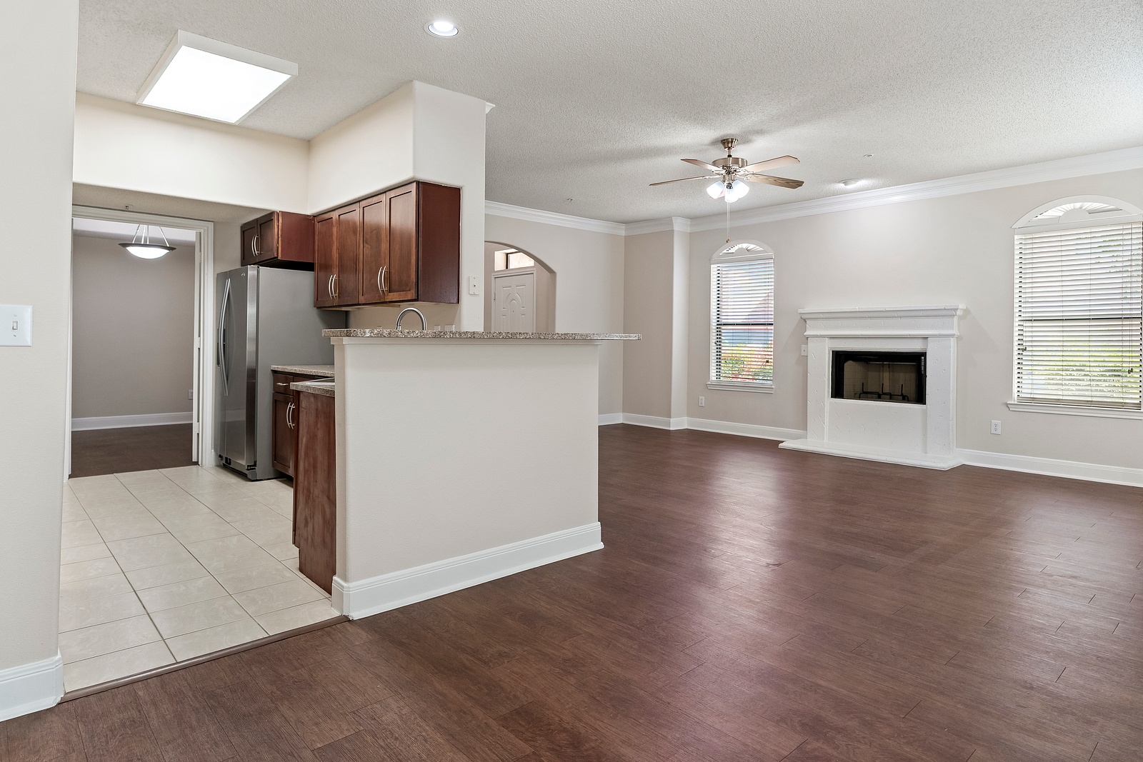 Open Concept Living Room with Cozy Fireplace