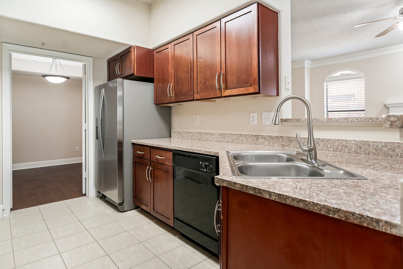 Fully Equipped Kitchen with Wood Cabinetry