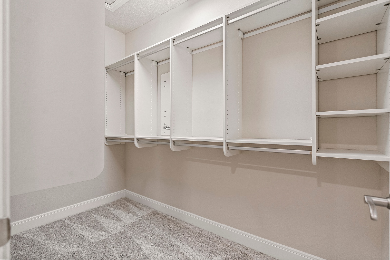 Spacious Walk-In Closet with Built-In Shelving
