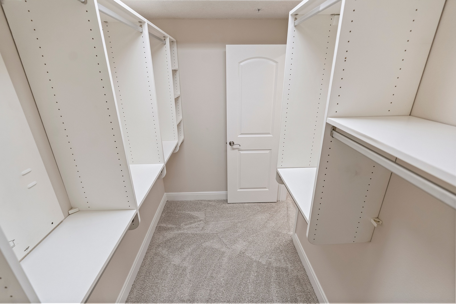 Spacious Walk-In Closet with Custom Shelving