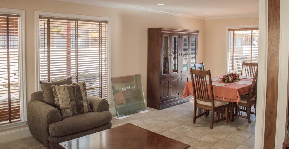 Tiled Living Room with Large Windows