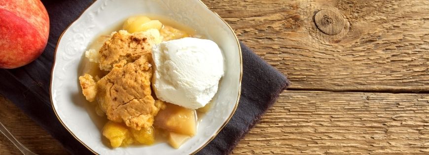 Here Is the Perfect Southern Peach Cobbler Recipe For Your Next Summertime Gathering Cover Photo