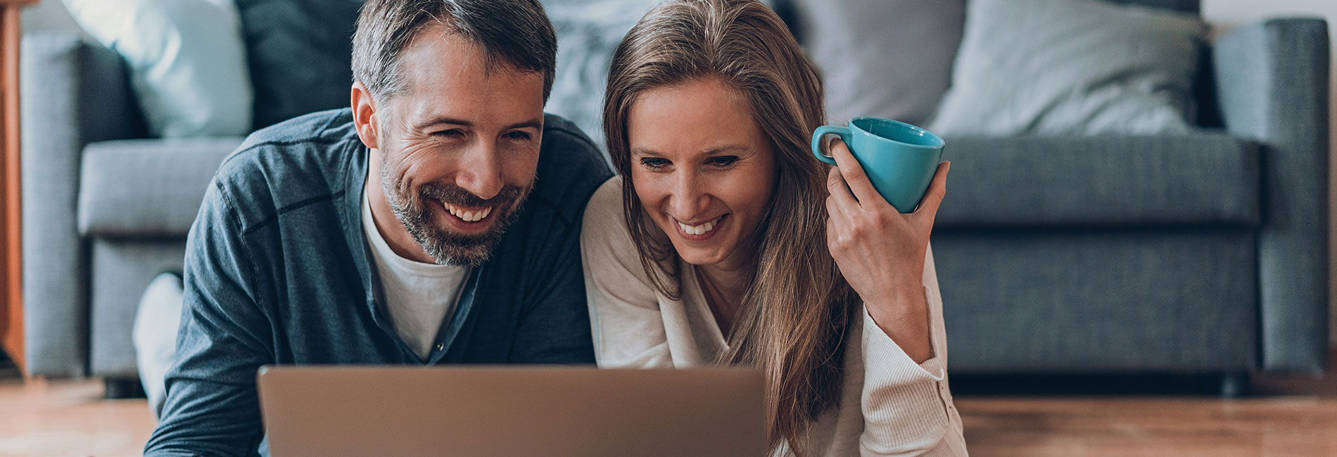 Middle Aged Couple on Computer