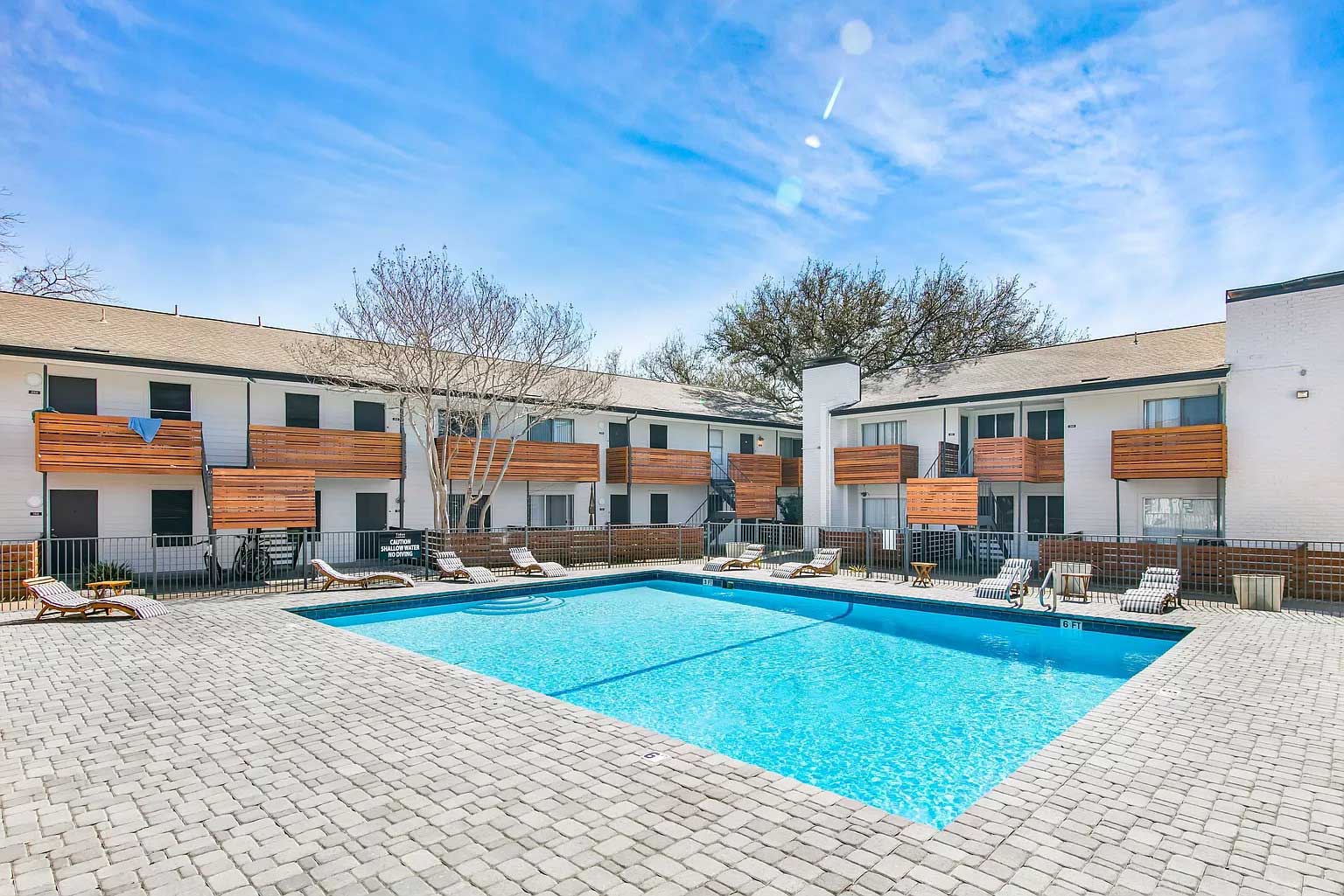 Spacious Community Pool Area with Large Poolside