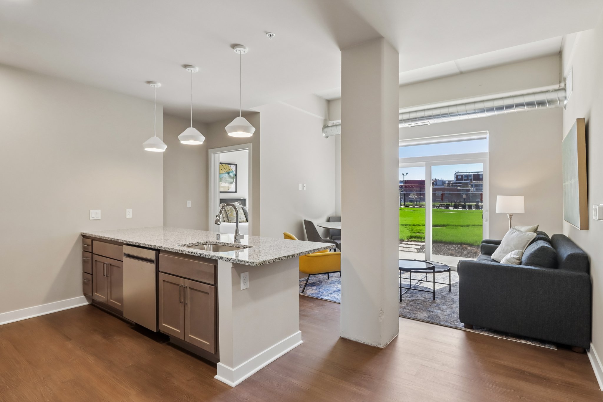 The View at Huxley Yards Apartments in Madison, WI Kitchen into Living