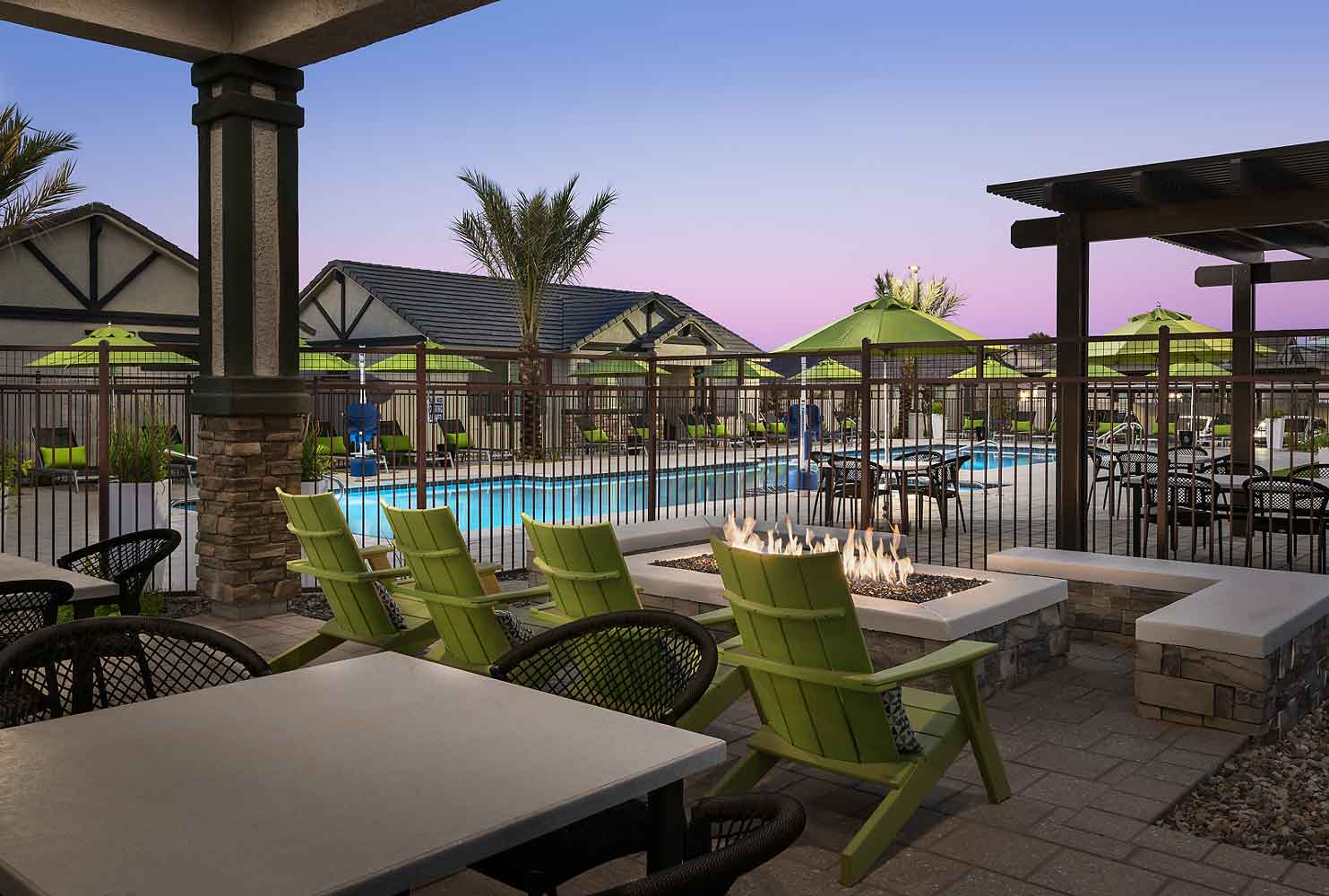 Poolside Outdoor Lounge at Village at Pioneer Park Apartments in Peoria, AZ