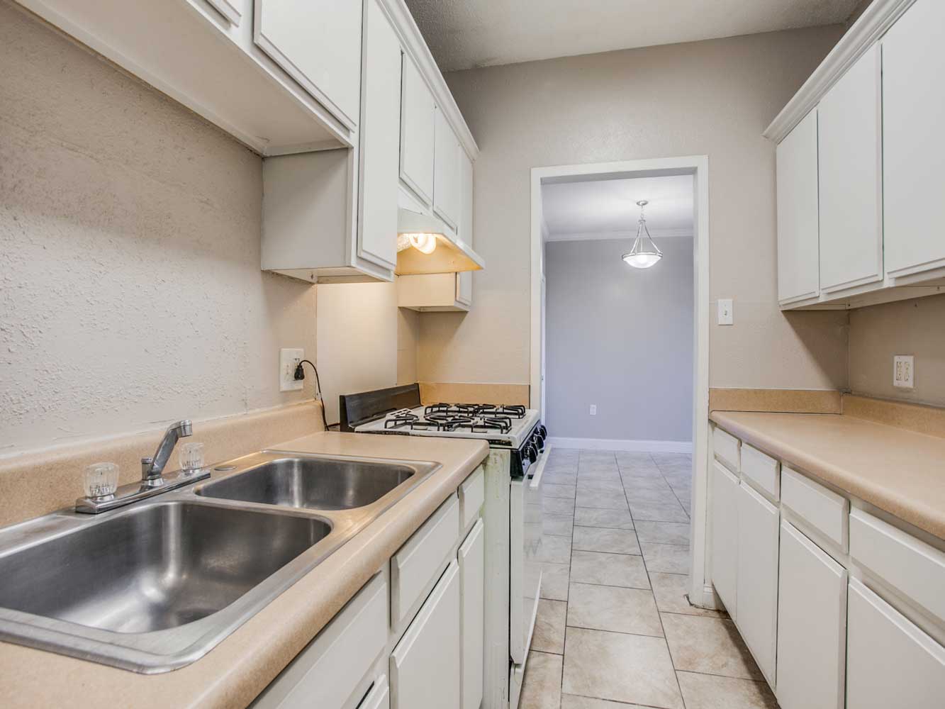 Ample Kitchen Cabinet Space at Villas on Sixty Fifth Apartments in Little Rock, Arkansas