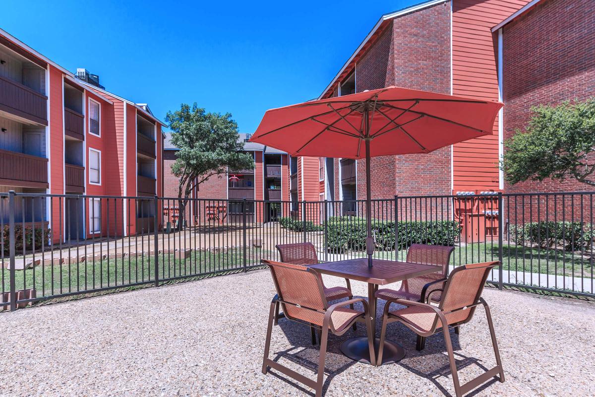 Outdoor Community Sunshade Area at Villa Vista Apartments in Dallas, TX