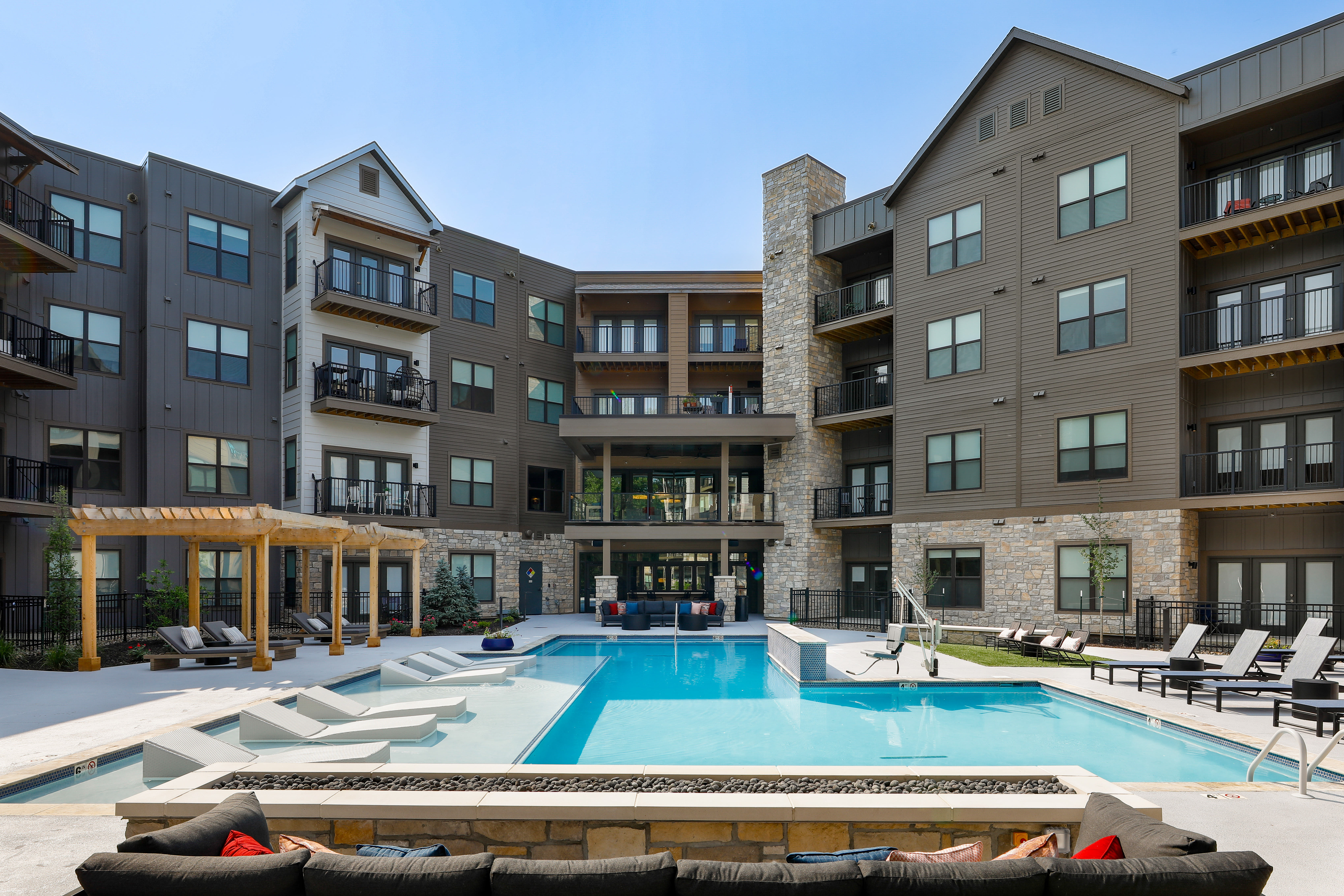 Oasis of Relaxation: Courtyard Pool at Wheatfield Village Apartments