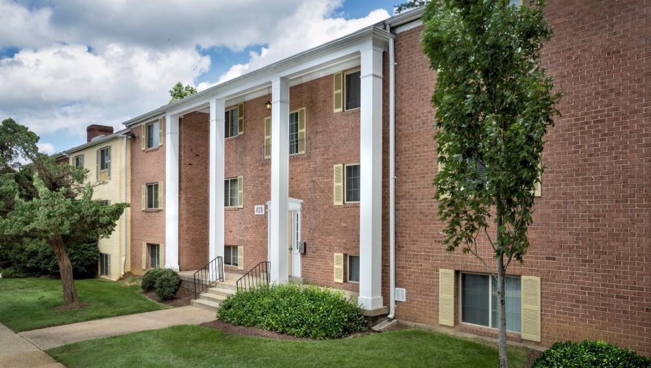 Expansive Courtyard with Playground at Whitehall Square Apartments