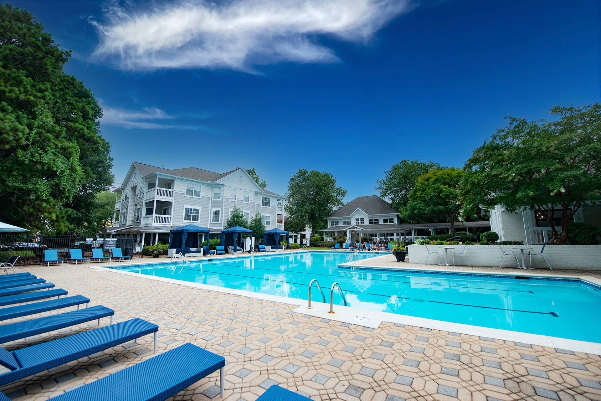 Resort-style Swimming Pool with Sundeck at Wildwood Ridge Apartments