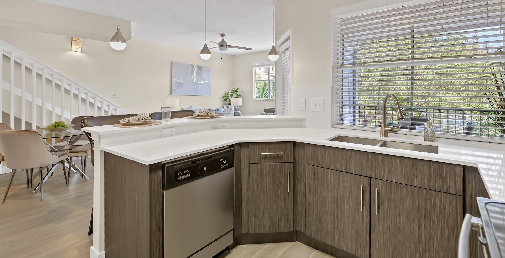 Brightly-lit Kitchen with Breakfast Bar at Windsor Castle Luxury Rental Community