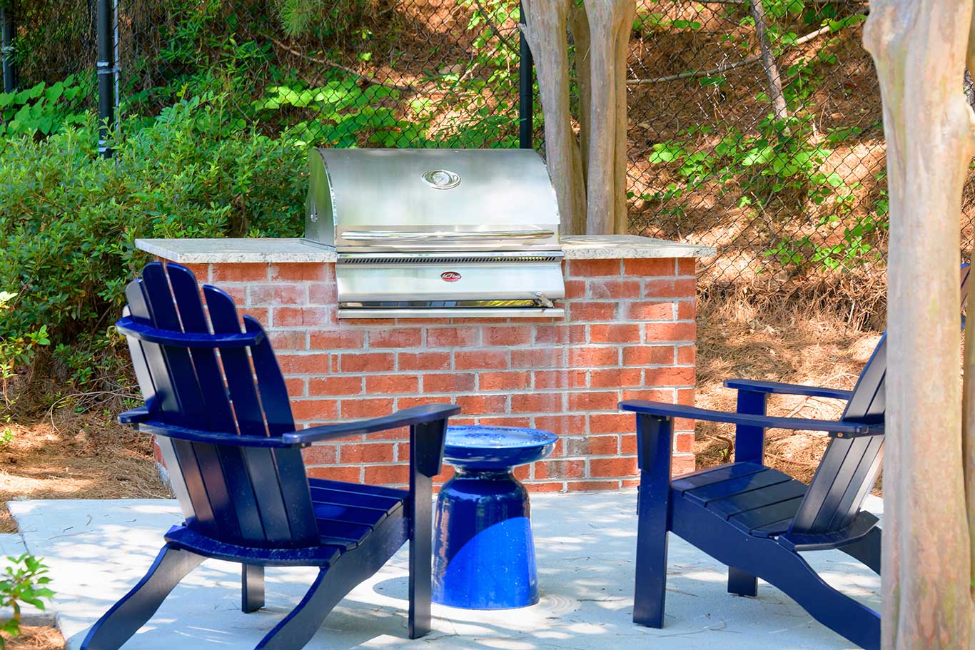 Outdoor Fire Pit Area with Seating at Windward Place Apartments