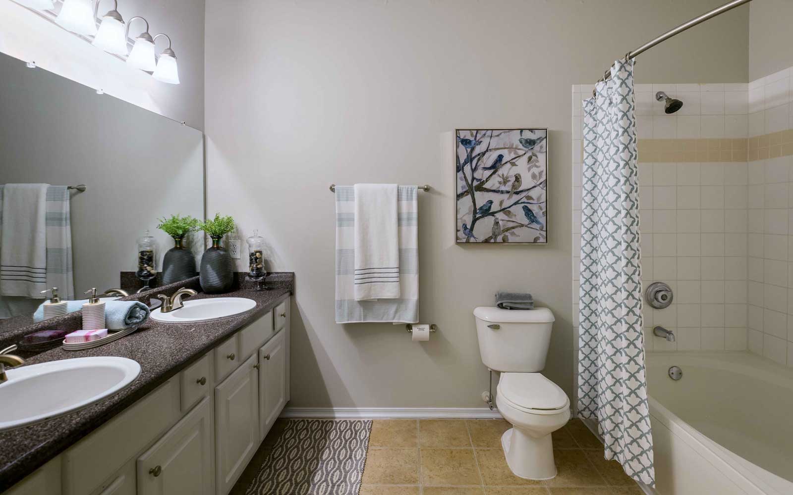 Bathrooms with Shower and Tub at Windward Place Apartments 