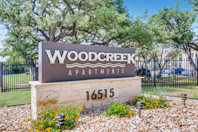 Property Signage at Woodcreek Apartments In Wimberley, TX.