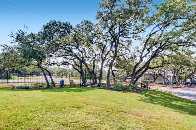 Lush Landscapes at Woodcreek Apartments In Wimberley, TX. 