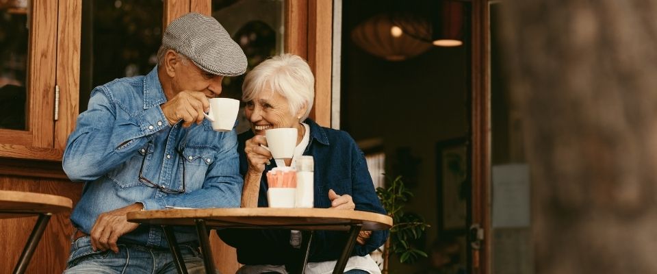 Two Seniors Hanging Out over a Cup of Coffee